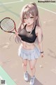 A girl holding a tennis racket on a tennis court.