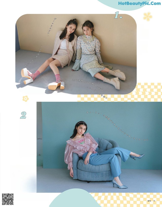 A couple of women sitting on top of a blue couch.